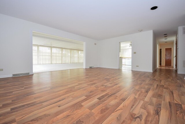 50 Ridgewood Rd, Elk Grove Village, IL 60007 - empty room with wood finished floors and baseboards