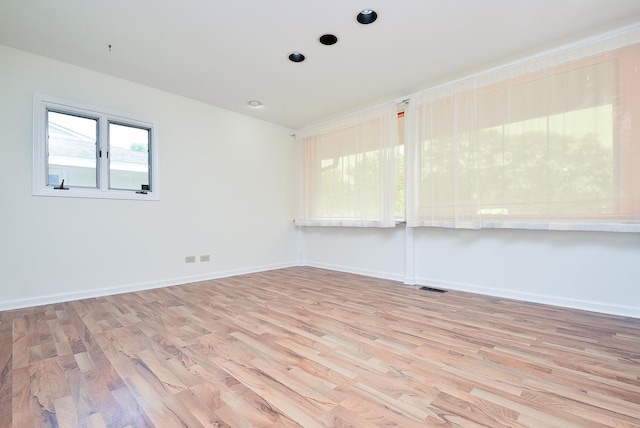 50 Ridgewood Rd, Elk Grove Village, IL 60007 - empty room featuring light wood-style floors and baseboards
