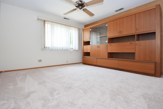 50 Ridgewood Rd, Elk Grove Village, IL 60007 - unfurnished bedroom with carpet floors, baseboards, and ceiling fan