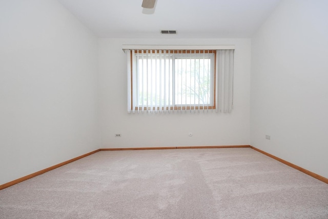50 Ridgewood Rd, Elk Grove Village, IL 60007 - carpeted empty room featuring baseboards and a ceiling fan