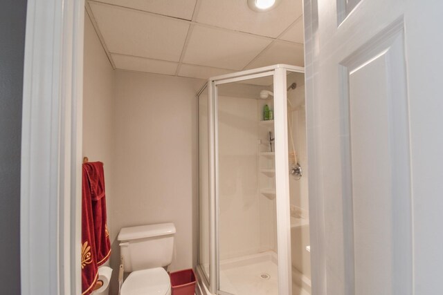 1403 N Motorola Dr, Pontiac, IL 61764 - full bathroom featuring toilet, a stall shower, and a paneled ceiling
