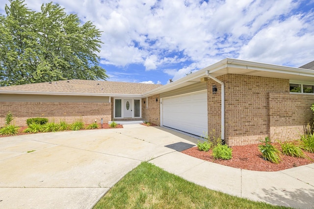 9836 Circle Pkwy, Palos Park, IL 60464 - single story home with brick siding, a garage, and concrete driveway