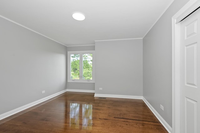 9836 Circle Pkwy, Palos Park, IL 60464 - spare room with ornamental molding, baseboards, and wood finished floors