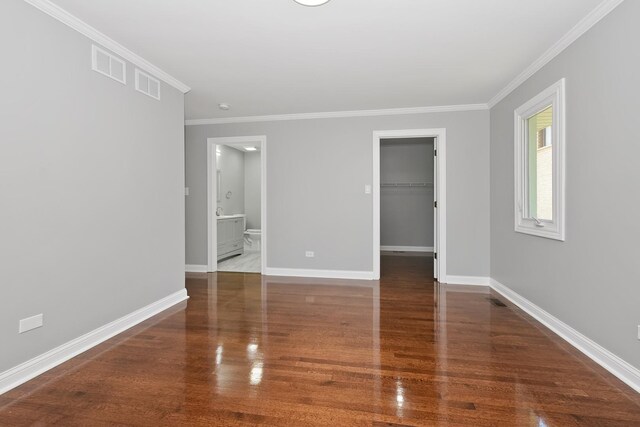 9836 Circle Pkwy, Palos Park, IL 60464 - spare room featuring crown molding, wood finished floors, and baseboards