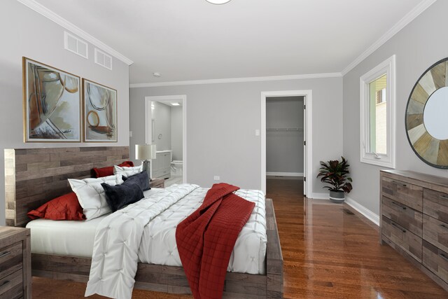 9836 Circle Pkwy, Palos Park, IL 60464 - bedroom with wood finished floors, crown molding, baseboards, a spacious closet, and ensuite bath