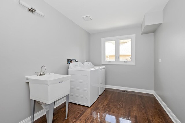9836 Circle Pkwy, Palos Park, IL 60464 - laundry area with washing machine and clothes dryer, dark wood-style floors, and baseboards