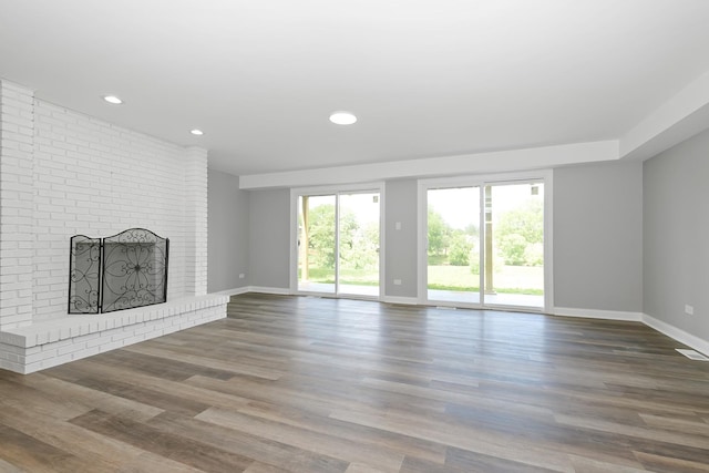 9836 Circle Pkwy, Palos Park, IL 60464 - unfurnished living room with baseboards, a fireplace, wood finished floors, and recessed lighting