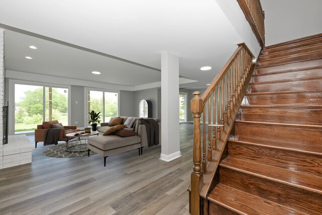 9836 Circle Pkwy, Palos Park, IL 60464 - staircase with recessed lighting, wood finished floors, and baseboards