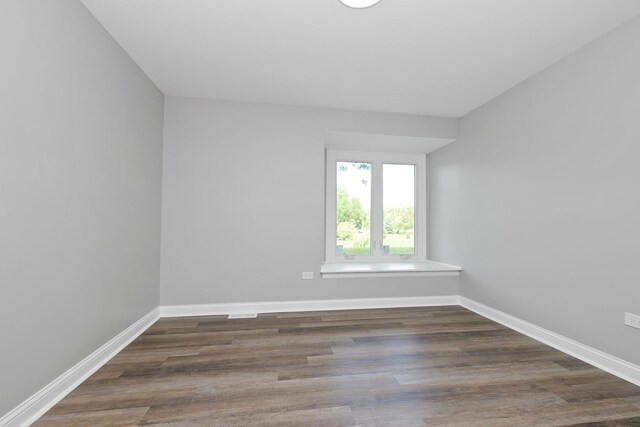 9836 Circle Pkwy, Palos Park, IL 60464 - empty room with wood finished floors and baseboards