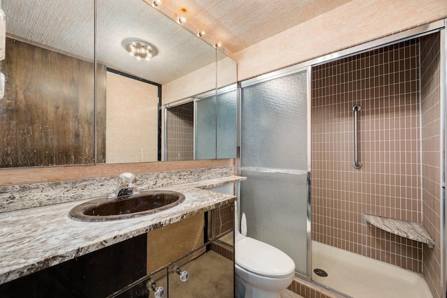 990 N Lake Shore Dr Unit 33E, Chicago, IL 60611 - bathroom featuring a stall shower, toilet, and vanity
