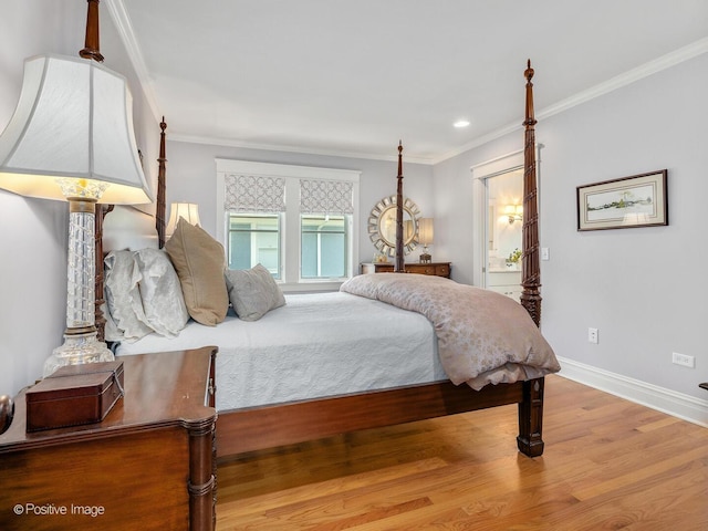 412 7th Ave, La Grange, IL 60525 - bedroom with wood finished floors, ornamental molding, ensuite bath, and recessed lighting