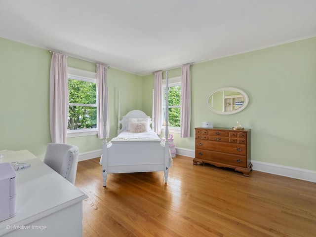 412 7th Ave, La Grange, IL 60525 - bedroom with multiple windows, light wood-type flooring, and ornamental molding