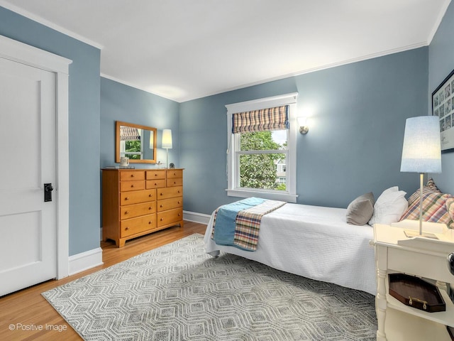 412 7th Ave, La Grange, IL 60525 - bedroom with wood finished floors and crown molding
