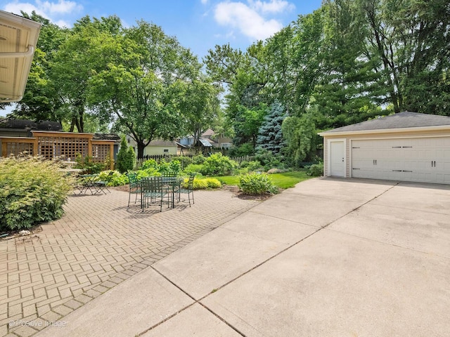 412 7th Ave, La Grange, IL 60525 - view of patio featuring a detached garage