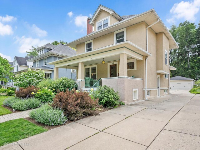 412 7th Ave, La Grange, IL 60525 - traditional style home with stucco siding, a porch, a garage, and a chimney