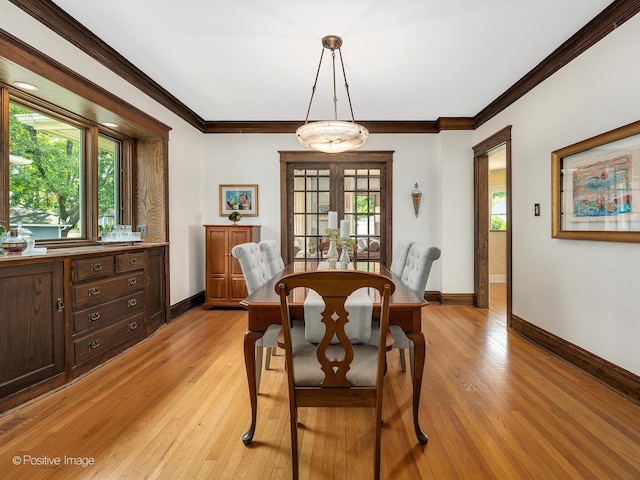 412 7th Ave, La Grange, IL 60525 - dining room with healthy amount of natural light, crown molding, and light wood-style flooring