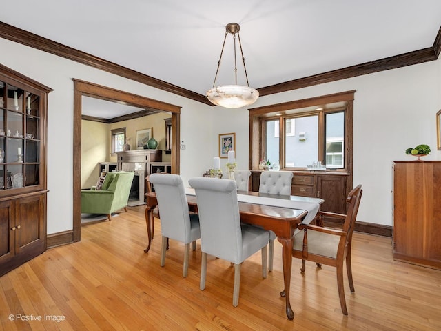 412 7th Ave, La Grange, IL 60525 - dining space featuring crown molding and light wood-style floors