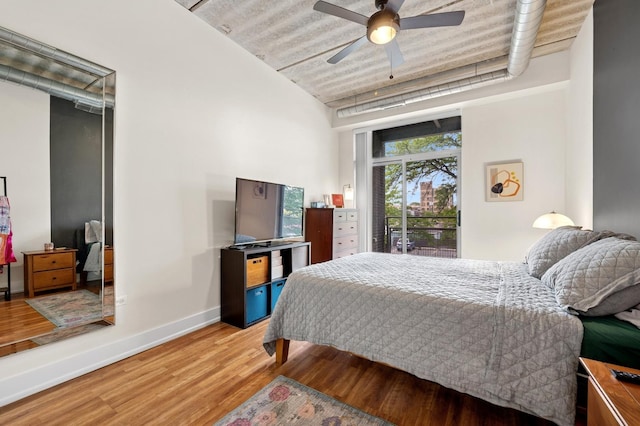 3201 W Leland Ave Unit 205, Chicago, IL 60625 - bedroom featuring wood finished floors, baseboards, a ceiling fan, and access to exterior