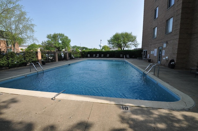 1455 Shermer Rd Unit 506, Northbrook, IL 60062 - community pool featuring a patio area