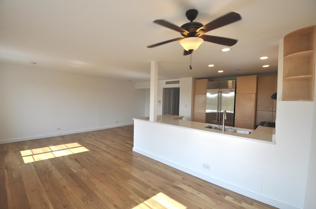1455 Shermer Rd Unit 506, Northbrook, IL 60062 - unfurnished room featuring a sink, wood finished floors, ceiling fan, recessed lighting, and baseboards
