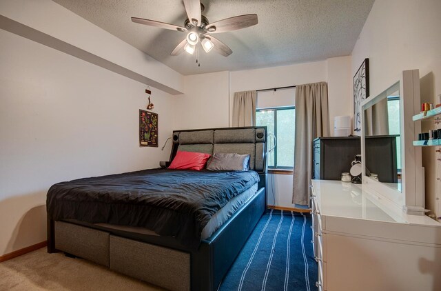 3111 Ingalls Ave Unit 3C, Joliet, IL 60435 - bedroom with dark carpet, a textured ceiling, baseboards, and ceiling fan