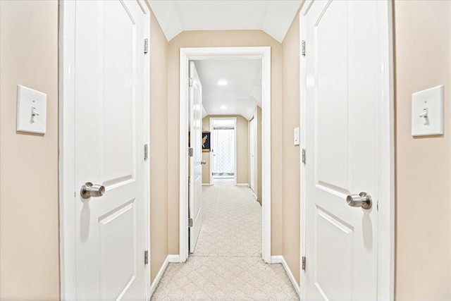 5011 W Deming Pl, Chicago, IL 60639 - hall with vaulted ceiling, baseboards, and light carpet