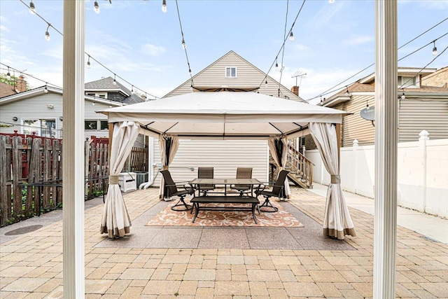 5011 W Deming Pl, Chicago, IL 60639 - fenced backyard with a gazebo, a patio, and outdoor dining space