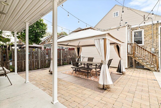 5011 W Deming Pl, Chicago, IL 60639 - view of patio / terrace with a gazebo and outdoor dining space