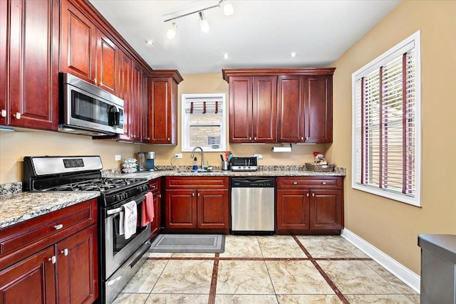 5011 W Deming Pl, Chicago, IL 60639 - kitchen featuring stainless steel appliances and dark brown cabinets