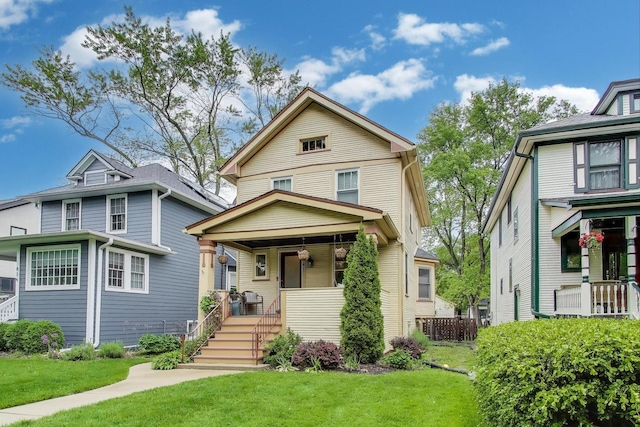 820 Woodbine Ave, Oak Park, IL 60302 - american foursquare style home with a porch and a front yard