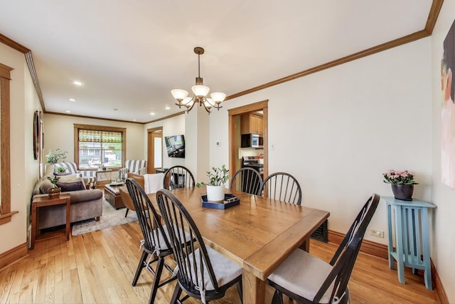 820 Woodbine Ave, Oak Park, IL 60302 - dining room featuring ornamental molding, a chandelier, light wood-style floors, baseboards, and recessed lighting