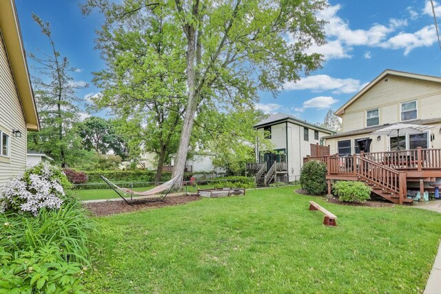 820 Woodbine Ave, Oak Park, IL 60302 - view of yard with stairway and a wooden deck