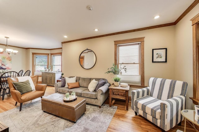 820 Woodbine Ave, Oak Park, IL 60302 - living room with light wood finished floors, a chandelier, ornamental molding, and recessed lighting