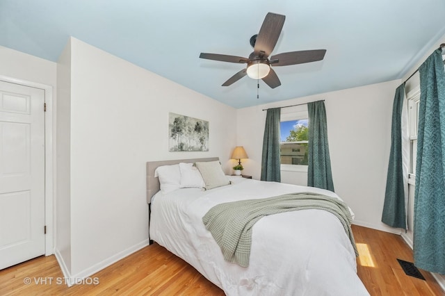 1910 E Crabtree Dr, Arlington Heights, IL 60004 - bedroom with light wood finished floors and ceiling fan