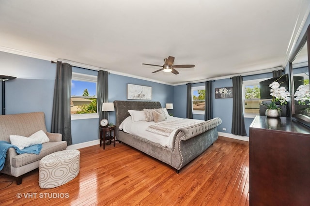 1910 E Crabtree Dr, Arlington Heights, IL 60004 - bedroom with light wood-style floors, crown molding, and a ceiling fan
