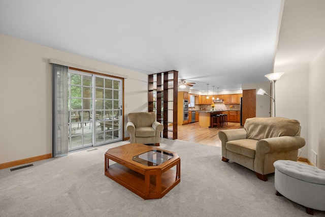 1291 Acorn Ct, Sleepy Hollow, IL 60118 - living room featuring a ceiling fan and baseboards