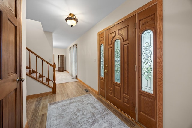 1291 Acorn Ct, Sleepy Hollow, IL 60118 - entryway featuring light wood-type flooring and stairway