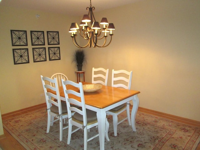 460 S NW Hwy Unit 409, Park Ridge, IL 60068 - dining space with a chandelier and baseboards