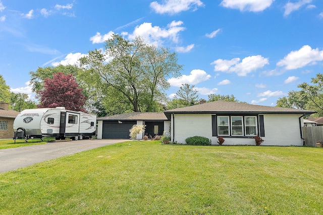 16527 S Ivy Ln, Plainfield, IL 60586 - view of front of home with a garage, asphalt driveway, and brick siding