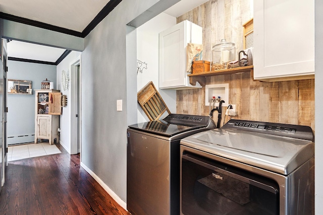 16527 S Ivy Ln, Plainfield, IL 60586 - washroom featuring cabinet space, ornamental molding, washing machine and clothes dryer, a baseboard radiator, and wood finished floors