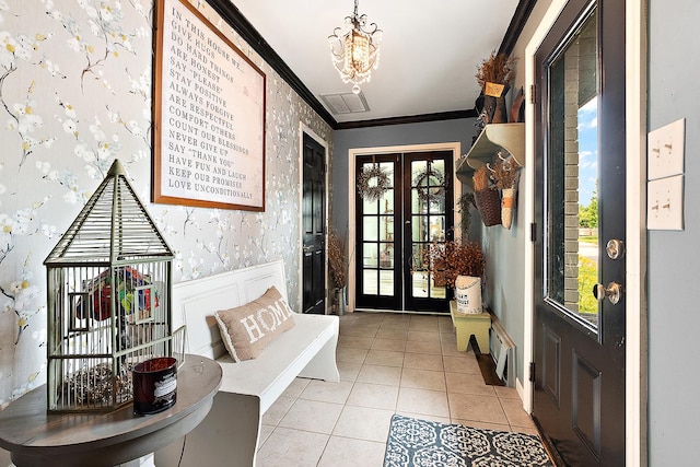 16527 S Ivy Ln, Plainfield, IL 60586 - entrance foyer featuring wallpapered walls, french doors, ornamental molding, light tile patterned floors, and a chandelier