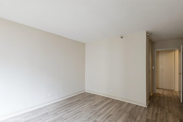 440 N Wabash Ave Unit 1103, Chicago, IL 60611 - empty room featuring light wood finished floors