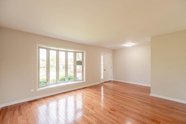 6133 Elm Ln, Matteson, IL 60443 - spare room with light wood-type flooring and baseboards