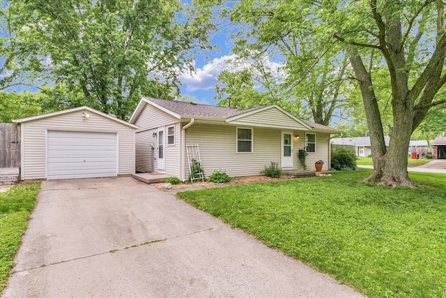 3310 Saratoga Dr, Champaign, IL 61821 - single story home featuring an outbuilding, a front lawn, a detached garage, driveway, and roof with shingles