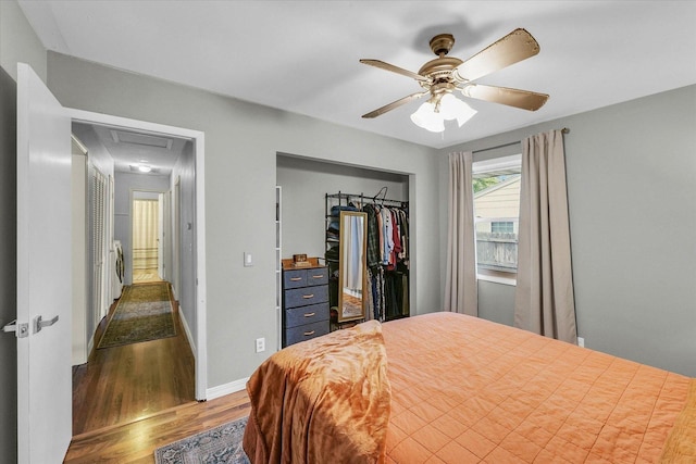 3310 Saratoga Dr, Champaign, IL 61821 - bedroom with a closet, wood finished floors, attic access, ceiling fan, and baseboards