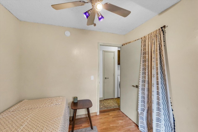 3310 Saratoga Dr, Champaign, IL 61821 - bedroom with light wood-type flooring and a ceiling fan