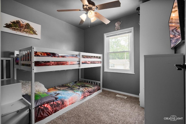 712 Cascade Ave, Romeoville, IL 60446 - carpeted bedroom featuring baseboards and ceiling fan