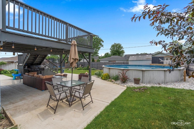 712 Cascade Ave, Romeoville, IL 60446 - view of patio featuring stairway, a deck, an outdoor living space, and area for grilling