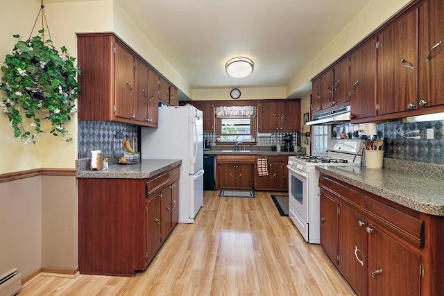16028 Laramie Ave, Oak Forest, IL 60452 - kitchen featuring white appliances, light wood-style floors, a sink, under cabinet range hood, and backsplash