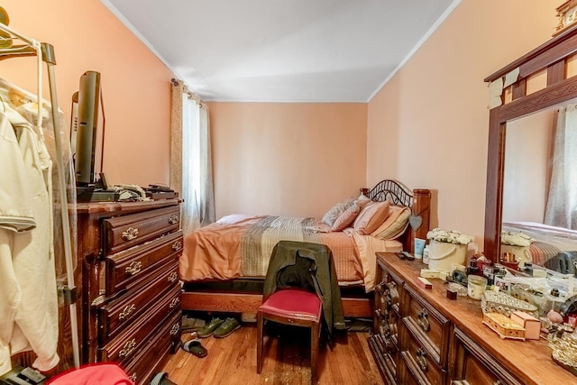 1909 Harvey Ave, Berwyn, IL 60402 - bedroom with crown molding and dark wood-style floors